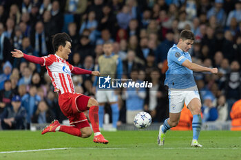 2023-09-19 - Red Star Belgrade midfielder In-beom Hwang (66) fails to stop a cross from Manchester City forward Julian Alvarez (19) during the Champions League match between Manchester City and Red Star Belgrade at the Etihad Stadium, Manchester, England on 19 September 2023. Photo Ian Stephen/ProSportsImages / DPPI - FOOTBALL - CHAMPIONS LEAGUE - MANCHESTER CITY V RED STAR BELGRADE - UEFA CHAMPIONS LEAGUE - SOCCER
