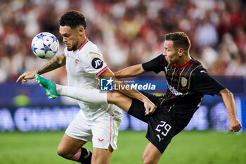 2023-01-08 - Lucas Ocampos of Sevilla FC and Przemyslaw Frankowski of RC Lens during the UEFA Champions League, Group B, match between Sevilla FC and RC Lens at Ramon Sanchez-Pizjuan stadium on September 20, 2023 in Sevilla, Spain. Photo Joaquin Corchero / SpainDPPI / DPPI - FOOTBALL - CHAMPIONS LEAGUE - FC SEVILLA V RC LENS - UEFA CHAMPIONS LEAGUE - SOCCER