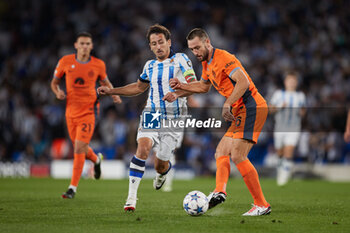 2023-09-20 - Mikel Oyarzabal of Real Sociedad competes for the ball with Stefan de Vrij of FC Internazionale during the UEFA Champions League match between Real Sociedad and FC Internazionale at Reale Arena on September 20, 2023, in San Sebastian, Spain. Photo Ricardo Larreina / SpainDPPi / DPPI - FOOTBALL - CHAMPIONS LEAGUE - REAL SOCIEDAD V FC INTERNAZIONLE - UEFA CHAMPIONS LEAGUE - SOCCER