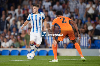 2023-09-20 - Ander Barrenetxea of Real Sociedad competes for the ball with Denzel Dumfries of FC Internazionale during the UEFA Champions League match between Real Sociedad and FC Internazionale at Reale Arena on September 20, 2023, in San Sebastian, Spain. Photo Ricardo Larreina / SpainDPPi / DPPI - FOOTBALL - CHAMPIONS LEAGUE - REAL SOCIEDAD V FC INTERNAZIONLE - UEFA CHAMPIONS LEAGUE - SOCCER