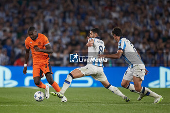 2023-09-20 - Marcus Thuram of FC Internazionale competes for the ball with Mikel Merino of Real Sociedad during the UEFA Champions League match between Real Sociedad and FC Internazionale at Reale Arena on September 20, 2023, in San Sebastian, Spain. Photo Ricardo Larreina / SpainDPPi / DPPI - FOOTBALL - CHAMPIONS LEAGUE - REAL SOCIEDAD V FC INTERNAZIONLE - UEFA CHAMPIONS LEAGUE - SOCCER