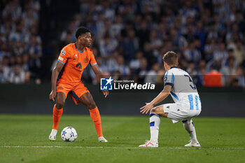 2023-09-20 - Denzel Dumfries of FC Internazionale competes for the ball with Aihen Munoz of Real Socieda during the UEFA Champions League match between Real Sociedad and FC Internazionale at Reale Arena on September 20, 2023, in San Sebastian, Spain. Photo Ricardo Larreina / SpainDPPi / DPPI - FOOTBALL - CHAMPIONS LEAGUE - REAL SOCIEDAD V FC INTERNAZIONLE - UEFA CHAMPIONS LEAGUE - SOCCER