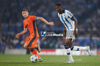 2023-09-20 - Sadiq Umar of Real Sociedad competes for the ball with Nicolo Barella of FC Internazionale during the UEFA Champions League match between Real Sociedad and FC Internazionale at Reale Arena on September 20, 2023, in San Sebastian, Spain. Photo Ricardo Larreina / SpainDPPi / DPPI - FOOTBALL - CHAMPIONS LEAGUE - REAL SOCIEDAD V FC INTERNAZIONLE - UEFA CHAMPIONS LEAGUE - SOCCER