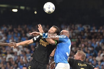 2023-10-03 - Nacho Fernandez of Real Madrid FC competes for the ball with Leo Ostigard of SSC Napoli during the Uefa Champions League between SSC Napoli vs Real Madrid FC at Diego Armando Maradona Stadium - SSC NAPOLI VS REAL MADRID FC - UEFA CHAMPIONS LEAGUE - SOCCER