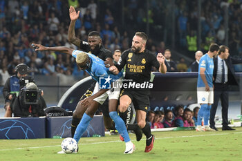 2023-10-03 - Antonio Rudiger of Real Madrid FC competes for the ball with Victor Osimen of SSC Napoli during the Uefa Champions League between SSC Napoli vs Real Madrid FC at Diego Armando Maradona Stadium - SSC NAPOLI VS REAL MADRID FC - UEFA CHAMPIONS LEAGUE - SOCCER