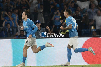 2023-10-03 - Piotr Zielinski of SSC Napoli celebrates after scoring goal during the Uefa Champions League between SSC Napoli vs Real Madrid FC at Diego Armando Maradona Stadium - SSC NAPOLI VS REAL MADRID FC - UEFA CHAMPIONS LEAGUE - SOCCER