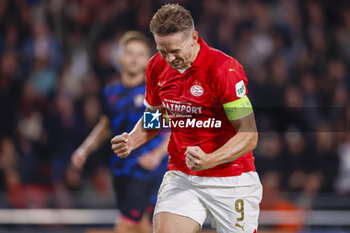 2023-10-03 - Luuk de Jong of PSV celebrates after scoring his sides first goal 1-1 during the UEFA Champions League, Group B football match between PSV Eindhoven and Sevilla FC on October 3, 2023 at the Phillips Stadion in Eindhoven, Netherlands - FOOTBALL - CHAMPIONS LEAGUE - PSV EINDHOVEN V SEVILLA - UEFA CHAMPIONS LEAGUE - SOCCER