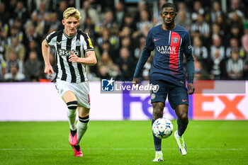 2023-10-04 - Anthony GORDON of Newcastle and Ousmane DEMBELE of PSG during the UEFA Champions League, Group F football match between Newcastle United FC and Paris Saint-Germain on October 4, 2023 at St James's Park in Newcastle upon Tyne, England - FOOTBALL - CHAMPIONS LEAGUE - NEWCASTLE V PARIS SG - UEFA CHAMPIONS LEAGUE - SOCCER