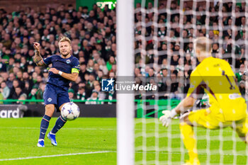 04/10/2023 - Ciro Immobile of SS Lazio and Joe Hart of Celtic during the UEFA Champions League, Group E football match between Celtic and SS Lazio on 4 October 2023 at Celtic Park in Glasgow, Scotland - FOOTBALL - CHAMPIONS LEAGUE - CELTIC V LAZIO - UEFA CHAMPIONS LEAGUE - CALCIO