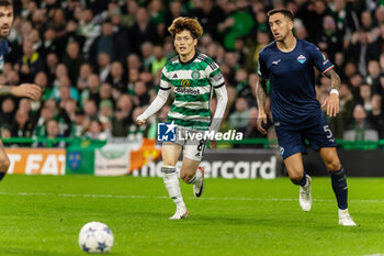 2023-10-04 - Kyogo Furuhashi of Celtic and Matias Vecino of SS Lazio during the UEFA Champions League, Group E football match between Celtic and SS Lazio on 4 October 2023 at Celtic Park in Glasgow, Scotland - FOOTBALL - CHAMPIONS LEAGUE - CELTIC V LAZIO - UEFA CHAMPIONS LEAGUE - SOCCER