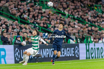2023-10-04 - Hyunjun Yang of Celtic and Daichi Kamada of SS Lazio during the UEFA Champions League, Group E football match between Celtic and SS Lazio on 4 October 2023 at Celtic Park in Glasgow, Scotland - FOOTBALL - CHAMPIONS LEAGUE - CELTIC V LAZIO - UEFA CHAMPIONS LEAGUE - SOCCER
