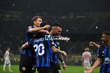 2023-10-24 - Hakan Calhanoglu of Fc Inter and team Inter FC celebrating after a goal during the UEFA Champions League match between Inter FC Internazionale and FC Salzburg , on October 24, 2023, at Giuseppe Meazza San Siro Siro stadium in Milan, Italy. Photo Tiziano Ballabio - INTER - FC INTERNAZIONALE VS FC SALZBURG - UEFA CHAMPIONS LEAGUE - SOCCER