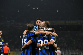 2023-10-24 - Hakan Calhanoglu of Fc Inter and team Inter FC celebrating after a goal during the UEFA Champions League match between Inter FC Internazionale and FC Salzburg , on October 24, 2023, at Giuseppe Meazza San Siro Siro stadium in Milan, Italy. Photo Tiziano Ballabio - INTER - FC INTERNAZIONALE VS FC SALZBURG - UEFA CHAMPIONS LEAGUE - SOCCER