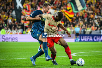 2023-10-24 - Luuk DE JONG of PSV Eindhoven and Kevin DANSO of Lens during the UEFA Champions League, Group B football match between RC Lens and PSV Eindhoven on October 24, 2023 at Bollaert-Delelis stadium in Lens, France - FOOTBALL - CHAMPIONS LEAGUE - LENS V PSV - UEFA CHAMPIONS LEAGUE - SOCCER