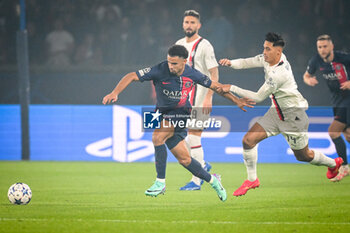 2023-10-25 - Warren ZAIRE-EMERY of PSG and Tijjani REIJNDERS of AC Milan during the UEFA Champions League, Group F football match between Paris Saint-Germain and AC Milan on October 25, 2023 at Parc des Princes stadium in Paris, France - FOOTBALL - CHAMPIONS LEAGUE - PARIS SG V MILAN - UEFA CHAMPIONS LEAGUE - SOCCER