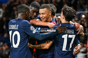 2023-10-25 - Kylian MBAPPE of PSG celebrate his goal with teammates during the UEFA Champions League, Group F football match between Paris Saint-Germain and AC Milan on October 25, 2023 at Parc des Princes stadium in Paris, France - FOOTBALL - CHAMPIONS LEAGUE - PARIS SG V MILAN - UEFA CHAMPIONS LEAGUE - SOCCER