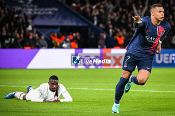 2023-10-25 - Fikayo TOMORI of AC Milan looks dejected and Kylian MBAPPE of PSG celebrates his goal during the UEFA Champions League, Group F football match between Paris Saint-Germain and AC Milan on October 25, 2023 at Parc des Princes stadium in Paris, France - FOOTBALL - CHAMPIONS LEAGUE - PARIS SG V MILAN - UEFA CHAMPIONS LEAGUE - SOCCER