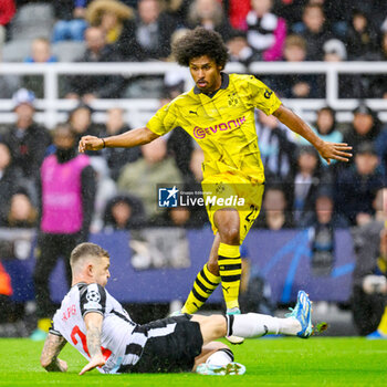 2023-10-25 - Kieran Trippier of Newcastle tackles Karim Adeyemi of Borussia Dortmund during the UEFA Champions League, Group F football match between Newcastle United and Borussia Dortmund on 25 October 2023 at St. James' Park in Newcastle, England - FOOTBALL - CHAMPIONS LEAGUE - NEWCASTLE V DORTMUND - UEFA CHAMPIONS LEAGUE - SOCCER