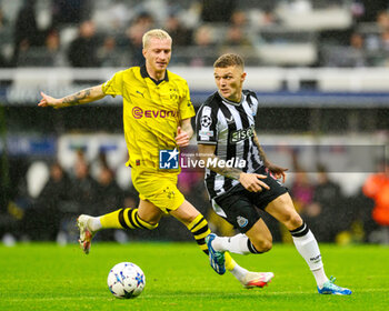 2023-10-25 - Kieran Trippier of Newcastle and Marco Reus of Borussia Dortmund during the UEFA Champions League, Group F football match between Newcastle United and Borussia Dortmund on 25 October 2023 at St. James' Park in Newcastle, England - FOOTBALL - CHAMPIONS LEAGUE - NEWCASTLE V DORTMUND - UEFA CHAMPIONS LEAGUE - SOCCER