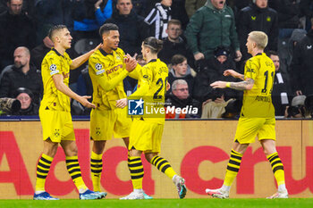 2023-10-25 - Felix Nmecha of Borussia Dortmund celebrates with Marcel Sabitzer after he scores the opening goal 0-1 during the UEFA Champions League, Group F football match between Newcastle United and Borussia Dortmund on 25 October 2023 at St. James' Park in Newcastle, England - FOOTBALL - CHAMPIONS LEAGUE - NEWCASTLE V DORTMUND - UEFA CHAMPIONS LEAGUE - SOCCER