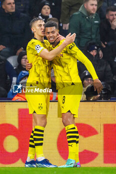 2023-10-25 - Felix Nmecha of Borussia Dortmund celebrates with Nico Schlotterbeck after he scores the opening goal 0-1 during the UEFA Champions League, Group F football match between Newcastle United and Borussia Dortmund on 25 October 2023 at St. James' Park in Newcastle, England - FOOTBALL - CHAMPIONS LEAGUE - NEWCASTLE V DORTMUND - UEFA CHAMPIONS LEAGUE - SOCCER