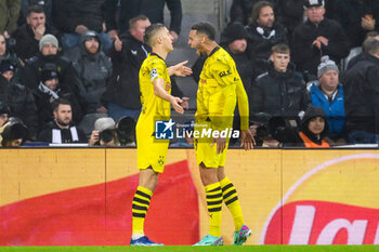 2023-10-25 - Felix Nmecha of Borussia Dortmund celebrates with Nico Schlotterbeck after he scores the opening goal 0-1 during the UEFA Champions League, Group F football match between Newcastle United and Borussia Dortmund on 25 October 2023 at St. James' Park in Newcastle, England - FOOTBALL - CHAMPIONS LEAGUE - NEWCASTLE V DORTMUND - UEFA CHAMPIONS LEAGUE - SOCCER