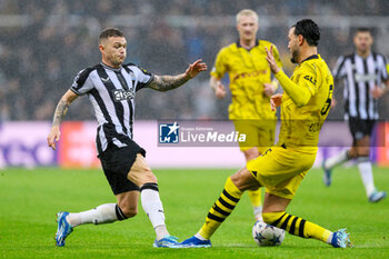 2023-10-25 - Kieran Trippier of Newcastle and Ramy Bensebaini of Borussia Dortmund during the UEFA Champions League, Group F football match between Newcastle United and Borussia Dortmund on 25 October 2023 at St. James' Park in Newcastle, England - FOOTBALL - CHAMPIONS LEAGUE - NEWCASTLE V DORTMUND - UEFA CHAMPIONS LEAGUE - SOCCER