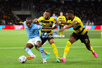 2023-10-26 - Jeremy Doku (11) of Manchester City and Meschack Elia (15), Ulisses Garcia (21) of Young Boys during the UEFA Champions League, Group G football match between BSC Young Boys and Manchester City on 25 October 2023 at Stade de Suisse in Bern, Switzerland - FOOTBALL - CHAMPIONS LEAGUE - YOUNG BOYS V MANCHESTER CITY - UEFA CHAMPIONS LEAGUE - SOCCER