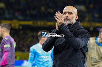 2023-10-26 - Pep Guardiola Manager of Manchester City thanks fans at full time during the UEFA Champions League, Group G football match between BSC Young Boys and Manchester City on 25 October 2023 at Stade de Suisse in Bern, Switzerland - FOOTBALL - CHAMPIONS LEAGUE - YOUNG BOYS V MANCHESTER CITY - UEFA CHAMPIONS LEAGUE - SOCCER