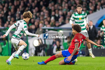 2023-10-25 - Kyogo Furuhashi of Celtic and Axel Witsel of Atlético de Madrid during the UEFA Champions League, Group E football match between Celtic and Atletico Madrid on 25 October 2023 at Celtic Park in Glasgow, Scotland - FOOTBALL - CHAMPIONS LEAGUE - CELTIC V ATLETICO MADRID - UEFA CHAMPIONS LEAGUE - SOCCER