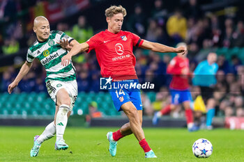2023-10-25 - Marcos Llorente of Atlético de Madrid and Daizen Maeda of Celtic during the UEFA Champions League, Group E football match between Celtic and Atletico Madrid on 25 October 2023 at Celtic Park in Glasgow, Scotland - FOOTBALL - CHAMPIONS LEAGUE - CELTIC V ATLETICO MADRID - UEFA CHAMPIONS LEAGUE - SOCCER