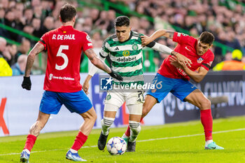 2023-10-25 - Luis Palma of Celtic and Nahuel Molina of Atlético de Madrid during the UEFA Champions League, Group E football match between Celtic and Atletico Madrid on 25 October 2023 at Celtic Park in Glasgow, Scotland - FOOTBALL - CHAMPIONS LEAGUE - CELTIC V ATLETICO MADRID - UEFA CHAMPIONS LEAGUE - SOCCER