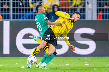 2023-11-07 - Felix Nmecha of Borussia Dortmund battles for the ball with Joe Willock of Newcastle United during the UEFA Champions League, Group F football match between Borussia Dortmund and Newcastle United on November 7, 2023 at Signal Iduna Park in Dortmund, Germany - FOOTBALL - CHAMPIONS LEAGUE - DORTMUND V NEWCASTLE - UEFA CHAMPIONS LEAGUE - SOCCER