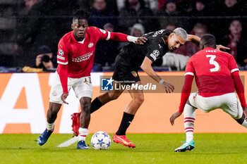 2023-11-08 - Johan Bakayoko of PSV and Facundo Medina of RC Lens during the UEFA Champions League, Group B football match between PSV and RC Lens on November 8, 2023 at Philips Stadion in Eindhoven, Netherlands - FOOTBALL - CHAMPIONS LEAGUE - PSV V LENS - UEFA CHAMPIONS LEAGUE - SOCCER