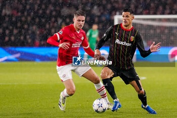 2023-11-08 - Florian Sotoca of RC Lens and Joey Veerman of PSV during the UEFA Champions League, Group B football match between PSV and RC Lens on November 8, 2023 at Philips Stadion in Eindhoven, Netherlands - FOOTBALL - CHAMPIONS LEAGUE - PSV V LENS - UEFA CHAMPIONS LEAGUE - SOCCER