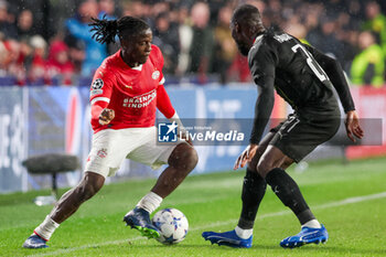 2023-11-08 - Johan Bakayoko of PSV and Massadio Haidara of RC Lens during the UEFA Champions League, Group B football match between PSV and RC Lens on November 8, 2023 at Philips Stadion in Eindhoven, Netherlands - FOOTBALL - CHAMPIONS LEAGUE - PSV V LENS - UEFA CHAMPIONS LEAGUE - SOCCER