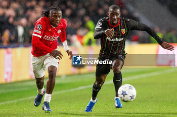 2023-11-08 - Johan Bakayoko of PSV and Massadio Haidara of RC Lens during the UEFA Champions League, Group B football match between PSV and RC Lens on November 8, 2023 at Philips Stadion in Eindhoven, Netherlands - FOOTBALL - CHAMPIONS LEAGUE - PSV V LENS - UEFA CHAMPIONS LEAGUE - SOCCER
