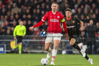 2023-11-08 - Luuk de Jong of PSV and Neil El Aynaoui of RC Lens during the UEFA Champions League, Group B football match between PSV and RC Lens on November 8, 2023 at Philips Stadion in Eindhoven, Netherlands - FOOTBALL - CHAMPIONS LEAGUE - PSV V LENS - UEFA CHAMPIONS LEAGUE - SOCCER