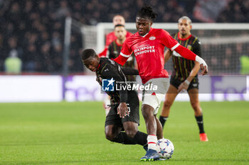 2023-11-08 - Johan Bakayoko of PSV battles for the ball with Nampalys Mendy of RC Lens during the UEFA Champions League, Group B football match between PSV and RC Lens on November 8, 2023 at Philips Stadion in Eindhoven, Netherlands - FOOTBALL - CHAMPIONS LEAGUE - PSV V LENS - UEFA CHAMPIONS LEAGUE - SOCCER