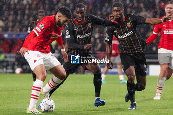 2023-11-08 - Ismael Saibari of PSV is challenged by Massadio Haidara of RC Lens during the UEFA Champions League, Group B football match between PSV and RC Lens on November 8, 2023 at Philips Stadion in Eindhoven, Netherlands - FOOTBALL - CHAMPIONS LEAGUE - PSV V LENS - UEFA CHAMPIONS LEAGUE - SOCCER