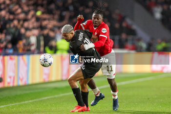 2023-11-08 - Johan Bakayoko of PSV battles for the ball with Facundo Medina of RC Lens during the UEFA Champions League, Group B football match between PSV and RC Lens on November 8, 2023 at Philips Stadion in Eindhoven, Netherlands - FOOTBALL - CHAMPIONS LEAGUE - PSV V LENS - UEFA CHAMPIONS LEAGUE - SOCCER