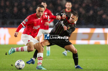 2023-11-08 - Sergino Dest of PSV battles for the ball with Przemyslaw Frankowski of RC Lens during the UEFA Champions League, Group B football match between PSV and RC Lens on November 8, 2023 at Philips Stadion in Eindhoven, Netherlands - FOOTBALL - CHAMPIONS LEAGUE - PSV V LENS - UEFA CHAMPIONS LEAGUE - SOCCER