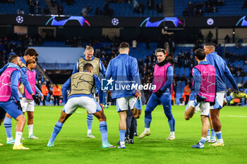2023-11-28 - Manchester City players warm up during the UEFA Champions League, Group G football match between Manchester City and RB Leipzig on 28 November 2023 at Etihad Stadium in Manchester, England - FOOTBALL - CHAMPIONS LEAGUE - MANCHESTER CITY V RB LEIPZIG - UEFA CHAMPIONS LEAGUE - SOCCER