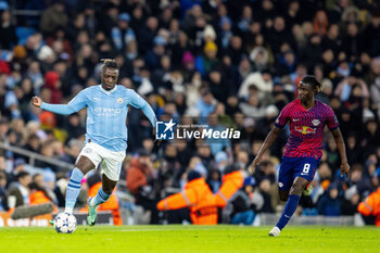 2023-11-28 - Manchester City forward Jeremy Doku (11) and Amadou Haidara of Leipzig during the UEFA Champions League, Group G football match between Manchester City and RB Leipzig on 28 November 2023 at Etihad Stadium in Manchester, England - FOOTBALL - CHAMPIONS LEAGUE - MANCHESTER CITY V RB LEIPZIG - UEFA CHAMPIONS LEAGUE - SOCCER