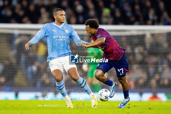 2023-11-28 - RB Leipzig forward Lois Openda (17) and Manuel Akanji of Manchester City during the UEFA Champions League, Group G football match between Manchester City and RB Leipzig on 28 November 2023 at Etihad Stadium in Manchester, England - FOOTBALL - CHAMPIONS LEAGUE - MANCHESTER CITY V RB LEIPZIG - UEFA CHAMPIONS LEAGUE - SOCCER