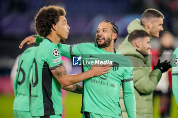 2023-11-28 - Axel Witsel and Memphis Depay of Atletico Madrid celebrate the win during the UEFA Champions League, Group E football match between Feyenoord and Atletico Madrid on November 28, 2023 at Stadion Feijenoord "De Kuip" in Rotterdam, Netherlands - FOOTBALL - CHAMPIONS LEAGUE - FEYENOORD V ATLETICO MADRID - UEFA CHAMPIONS LEAGUE - SOCCER