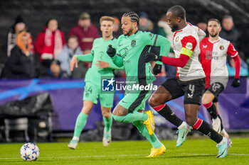 2023-11-28 - Memphis Depay of Atletico Madrid and Lutsharel Geertruida of Feyenoord during the UEFA Champions League, Group E football match between Feyenoord and Atletico Madrid on November 28, 2023 at Stadion Feijenoord "De Kuip" in Rotterdam, Netherlands - FOOTBALL - CHAMPIONS LEAGUE - FEYENOORD V ATLETICO MADRID - UEFA CHAMPIONS LEAGUE - SOCCER