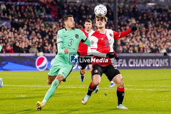 2023-11-28 - Jose Maria Gimenez of Atletico Madrid and Ayase Ueda of Feyenoord during the UEFA Champions League, Group E football match between Feyenoord and Atletico Madrid on November 28, 2023 at Stadion Feijenoord "De Kuip" in Rotterdam, Netherlands - FOOTBALL - CHAMPIONS LEAGUE - FEYENOORD V ATLETICO MADRID - UEFA CHAMPIONS LEAGUE - SOCCER