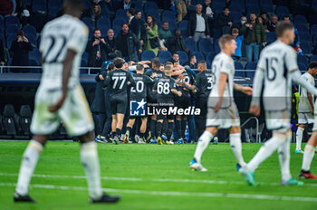 2023-11-29 - Andre Frank Zambo Anguissa of Napoli seen celebrating his goal with his teammates during the Champions League football match between Real Madrid and Napoli at Bernabeu Stadium in Madrid, Spain. - REAL MADRID VS NAPOLI - UEFA CHAMPIONS LEAGUE - SOCCER