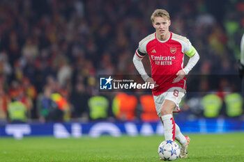 2023-11-29 - Arsenal midfielder Martin Odegaard during the UEFA Champions League, Group B football match between Arsenal and RC Lens on 29 November 2023 at the Emirates Stadium in London, England - FOOTBALL - CHAMPIONS LEAGUE - ARSENAL V LENS - UEFA CHAMPIONS LEAGUE - SOCCER